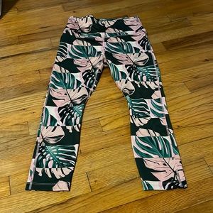 Nike dri-fit cropped leggings. Size medium. Green and pink tropical pattern